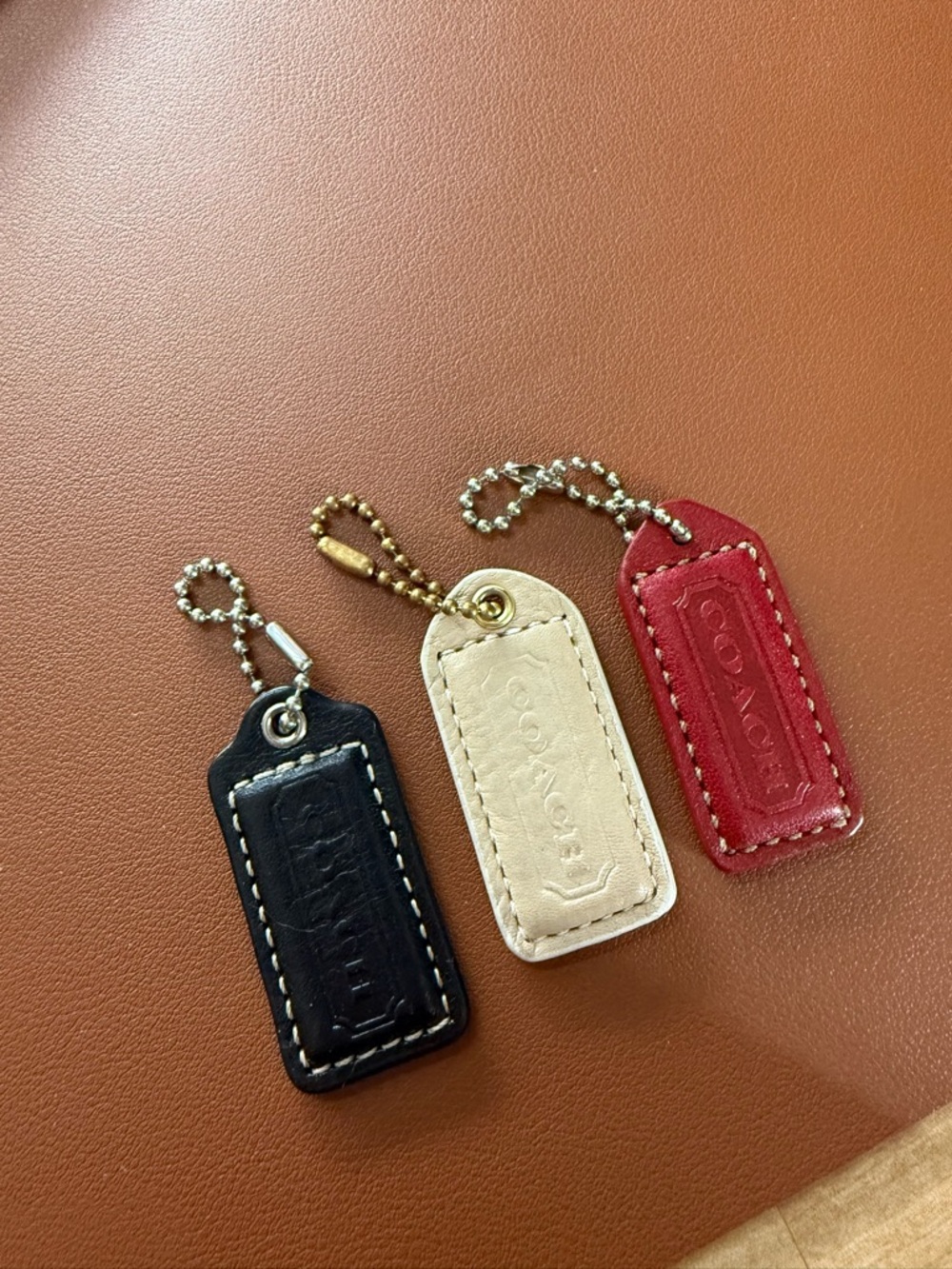 Bundle of 3 medium vintage Coach Hangtags
